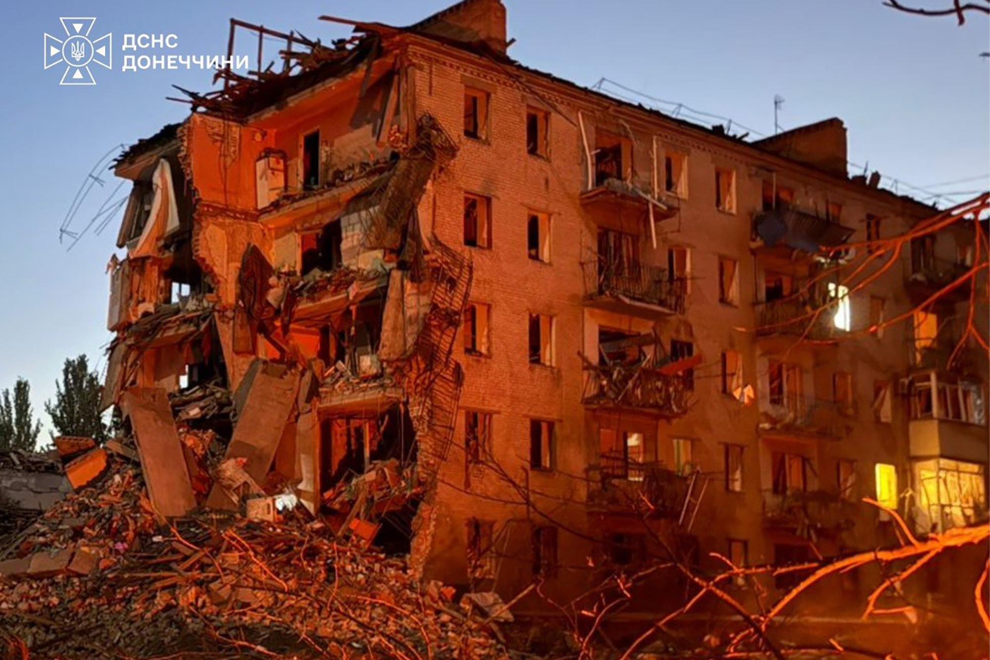 This photo provided by the Ukrainian Emergency Service shows a site of a residential building damaged by a Russian guided bomb in the city center of Sloviansk, Donetsk region, Ukraine, Monday, Aug. 31, 2026.